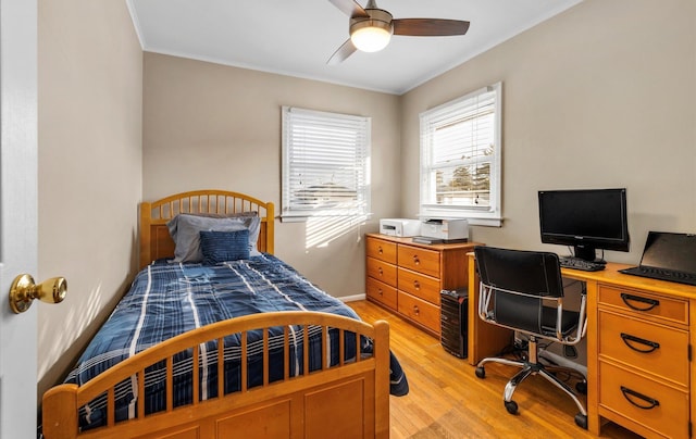 bedroom featuring ceiling fan and light hardwood / wood-style flooring