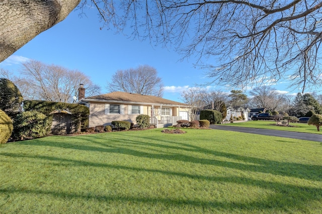 view of front of home with a front yard