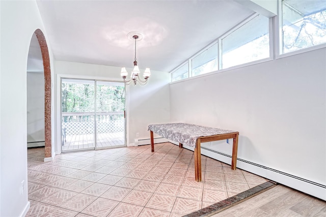 28 Robin Hood Rd, Montebello, NY 10901 - unfurnished dining area with a baseboard radiator and plenty of natural light