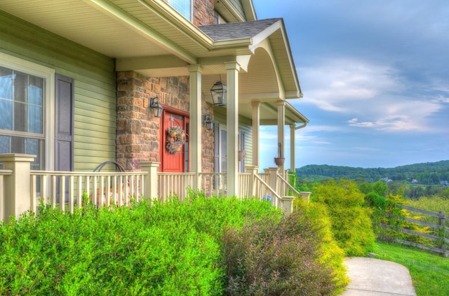 property entrance with covered porch