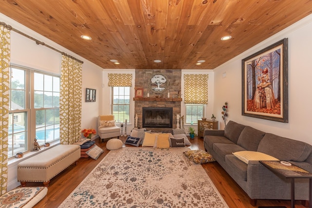 living room with dark hardwood / wood-style flooring, wood ceiling, and crown molding