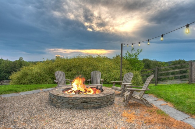 patio terrace at dusk with a fire pit