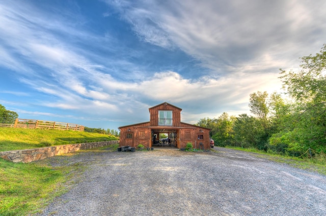 view of outbuilding with a rural view