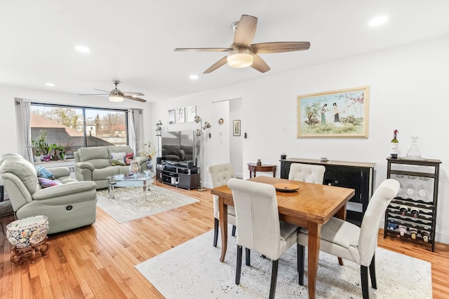 dining room with recessed lighting, light wood-type flooring, and ceiling fan