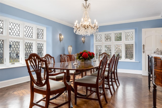 dining room with crown molding, dark parquet floors, and a notable chandelier