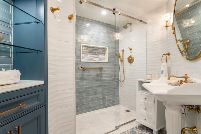 bathroom featuring tile walls, decorative backsplash, and tiled shower