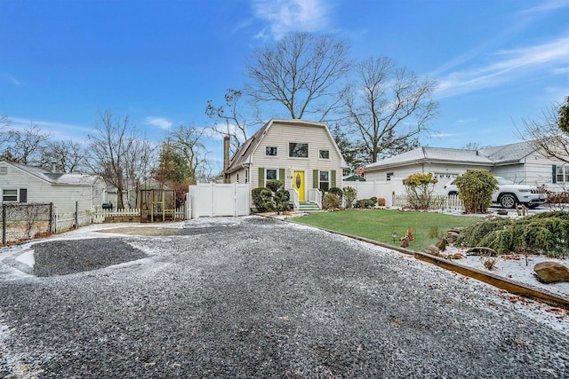 view of front of home with a front yard