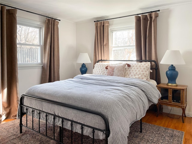 bedroom featuring wood-type flooring