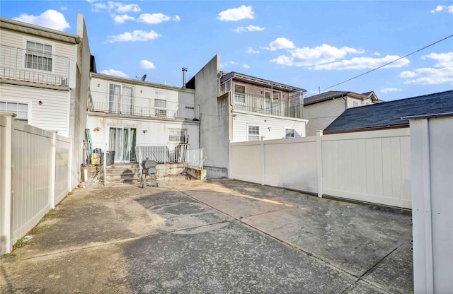 rear view of house with a patio