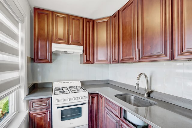 kitchen with sink and gas range gas stove