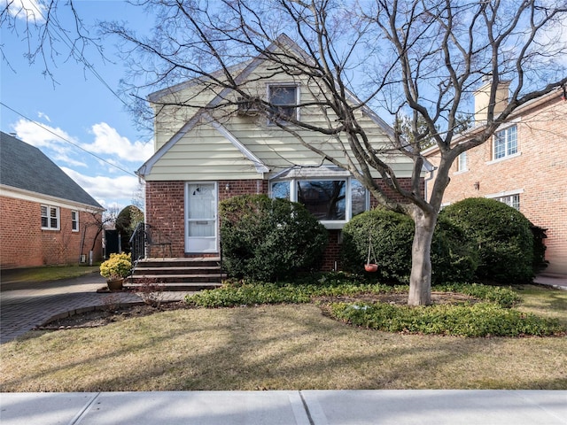 bungalow with a front yard