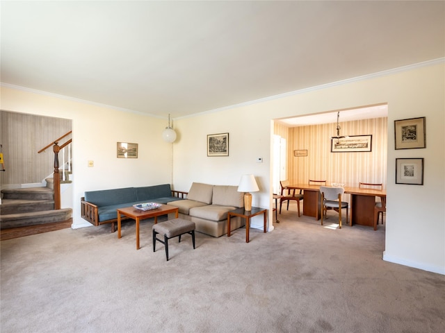 living room with crown molding and carpet floors