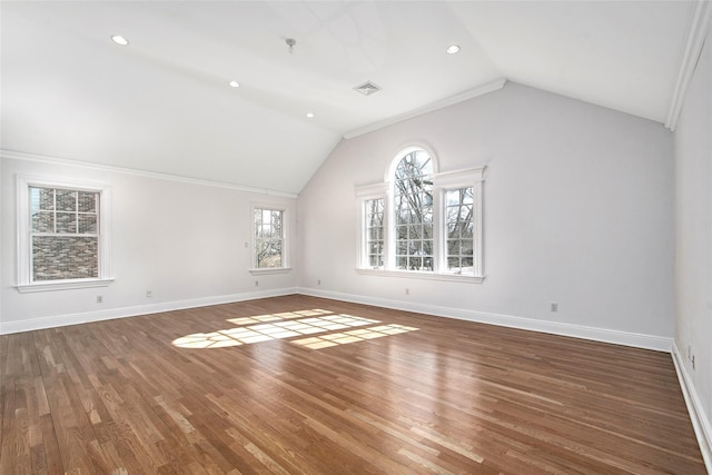 interior space featuring recessed lighting, wood finished floors, visible vents, baseboards, and vaulted ceiling