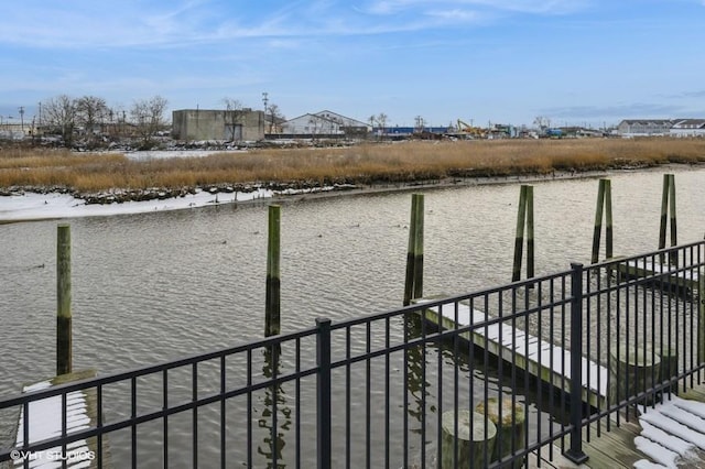 dock area featuring a water view