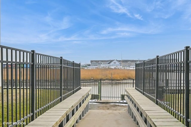 dock area featuring a water view