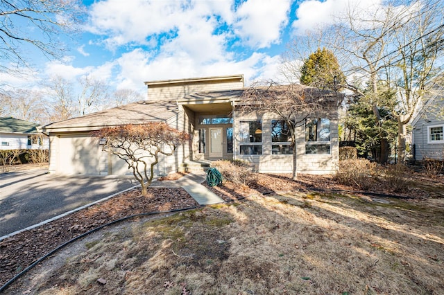 view of front of house featuring driveway and an attached garage