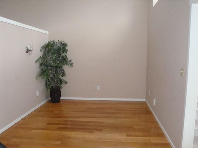 unfurnished room featuring wood-type flooring