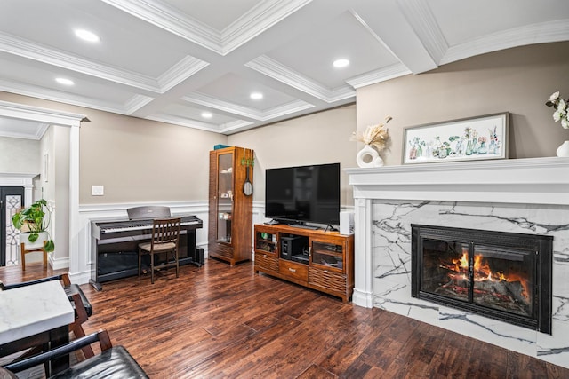 living room featuring beamed ceiling, a high end fireplace, and dark wood-type flooring