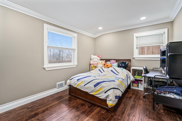 bedroom featuring dark wood-type flooring and crown molding