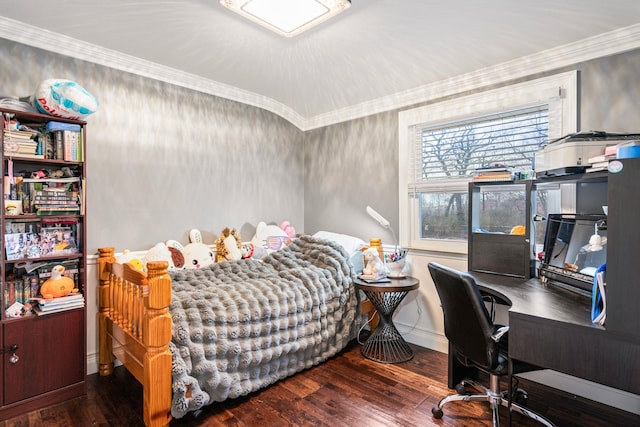 bedroom featuring ornamental molding and dark hardwood / wood-style floors