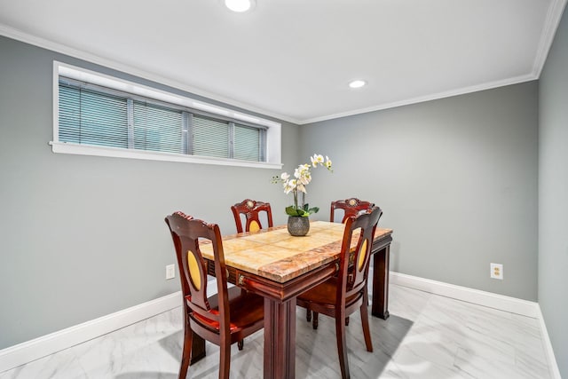 dining area with crown molding