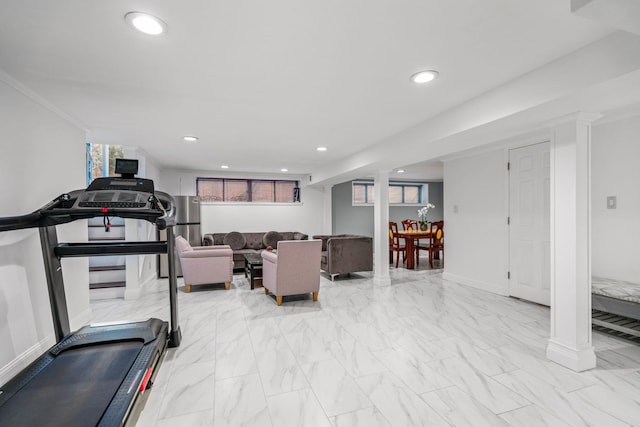 workout room featuring decorative columns