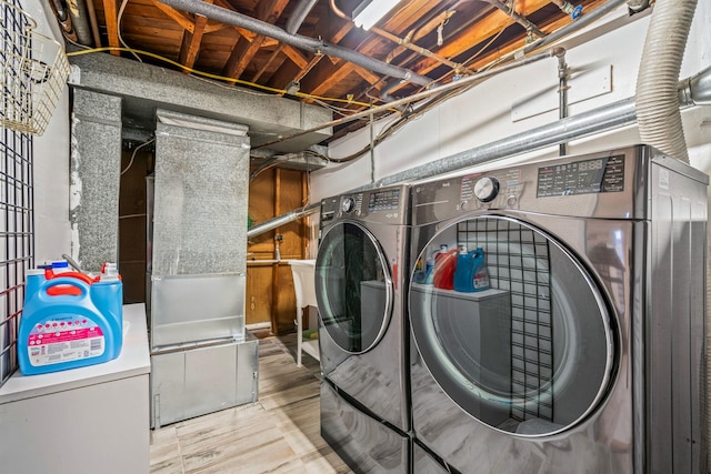 laundry area featuring independent washer and dryer