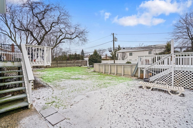 view of yard featuring a pool side deck