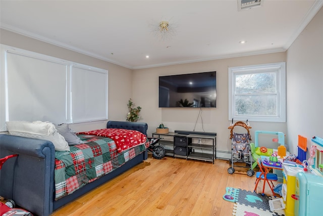 bedroom with crown molding and wood-type flooring