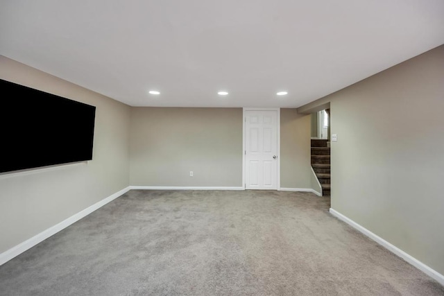 basement featuring carpet flooring