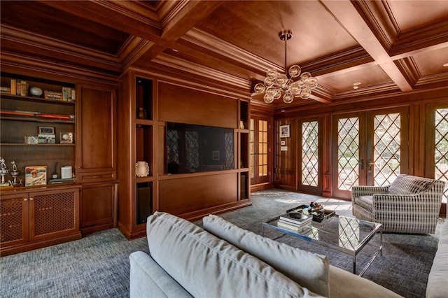 carpeted living room with wooden walls, beamed ceiling, ornamental molding, coffered ceiling, and french doors