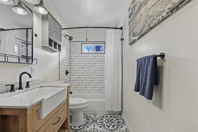 full bathroom with tile patterned flooring, vanity, shower / bath combination with curtain, and toilet