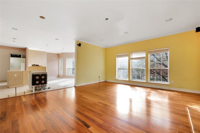 unfurnished living room featuring light wood-type flooring