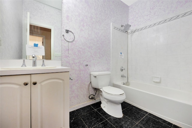 full bathroom featuring vanity, tiled shower / bath combo, tile patterned floors, and toilet