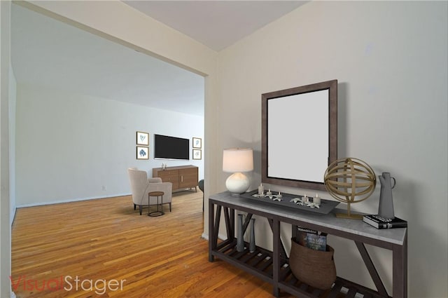 interior space with hardwood / wood-style flooring