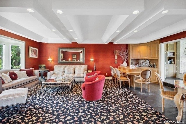 living room featuring beam ceiling