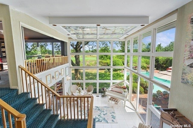sunroom / solarium featuring plenty of natural light