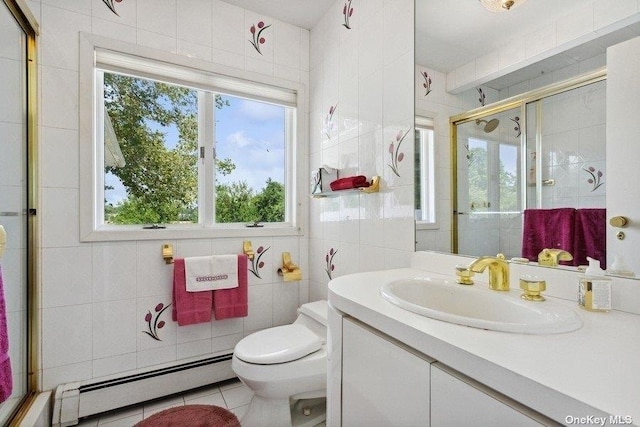 bathroom featuring tile walls, a baseboard heating unit, tile patterned flooring, vanity, and an enclosed shower