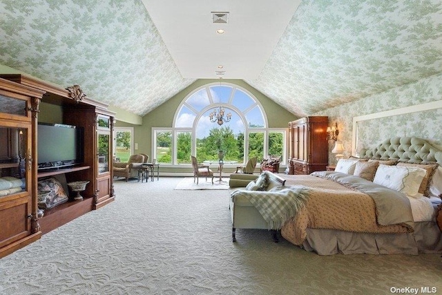 bedroom with high vaulted ceiling, carpet floors, and an inviting chandelier