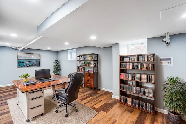 office space with light hardwood / wood-style floors