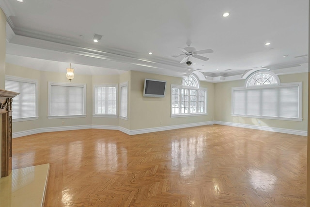 unfurnished living room featuring light parquet flooring, ornamental molding, and ceiling fan