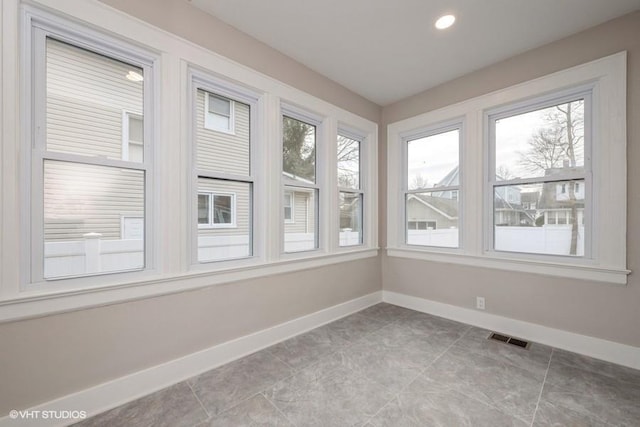 view of unfurnished sunroom