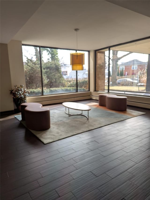 unfurnished living room featuring hardwood / wood-style floors