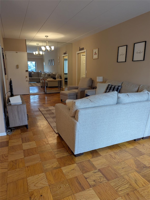 living room featuring a chandelier