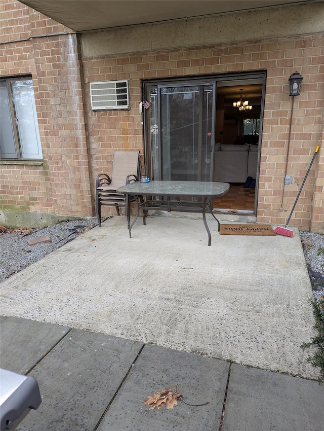 doorway to property featuring a patio