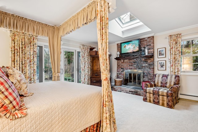 bedroom featuring a brick fireplace, a skylight, ornamental molding, and carpet flooring