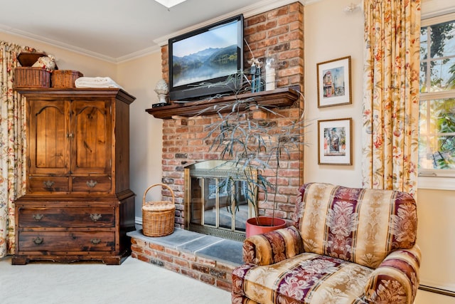 carpeted living room with ornamental molding and a brick fireplace