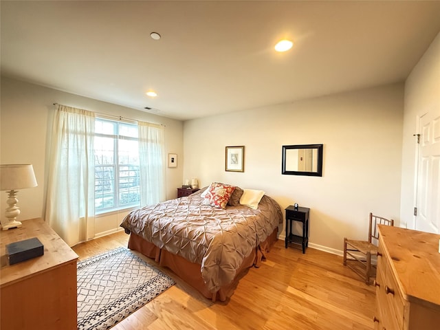 bedroom featuring light hardwood / wood-style floors