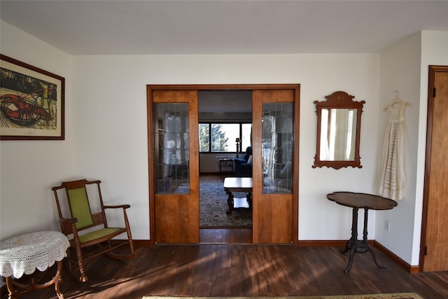 interior space with dark hardwood / wood-style floors