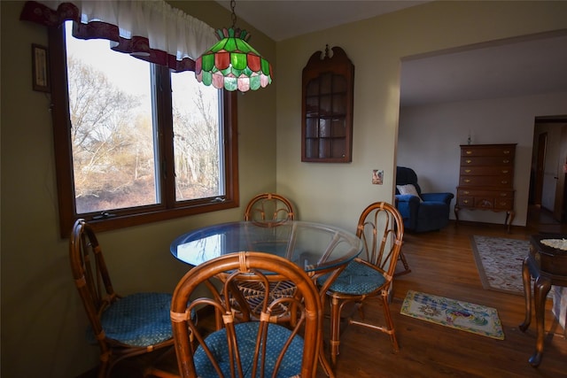 dining room featuring wood-type flooring